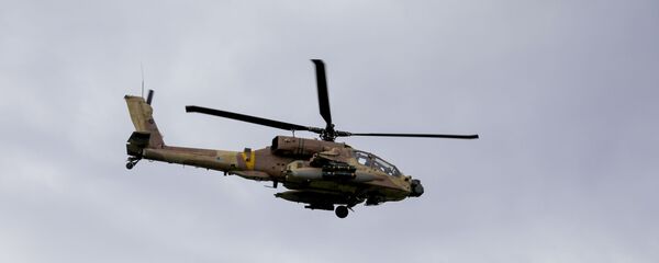 Израильский вертолет пролетает над Голанскими высотами Израильский вертолет пролетает над Голанскими высотами - 俄罗斯卫星通讯社