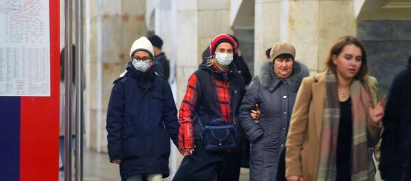 Пассажиры московского метро в медицинских масках - 俄羅斯衛星通訊社