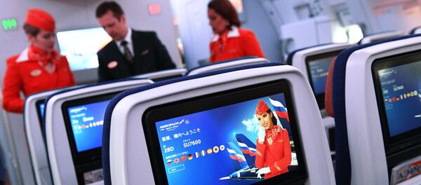 空姐介绍疫情期间搭乘飞机不能碰的地方 - 俄罗斯卫星通讯社