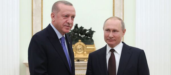 5 марта 2020. Президент РФ Владимир Путин и президент Турции Реджеп Тайип Эрдоган (слева) во время встречи.  - 俄罗斯卫星通讯社