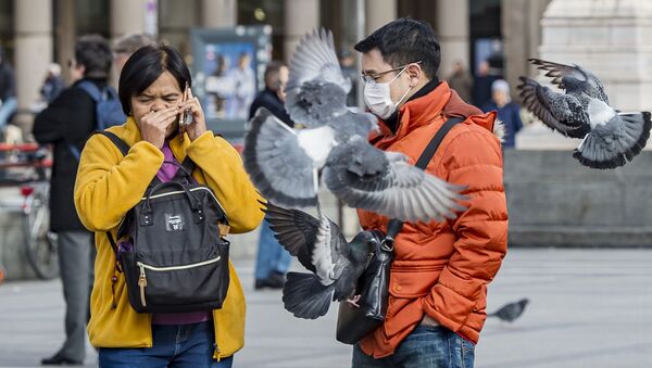 Туристы в защитных масках на одной из улиц Милана - 俄羅斯衛星通訊社