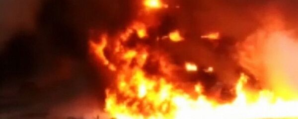 Тушение пожара   - 俄罗斯卫星通讯社