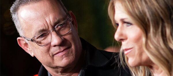 Актер Том Хэнкс и его жена певица Рита Уилсон Актер Том Хэнкс и его жена певица Рита Уилсон - 俄罗斯卫星通讯社