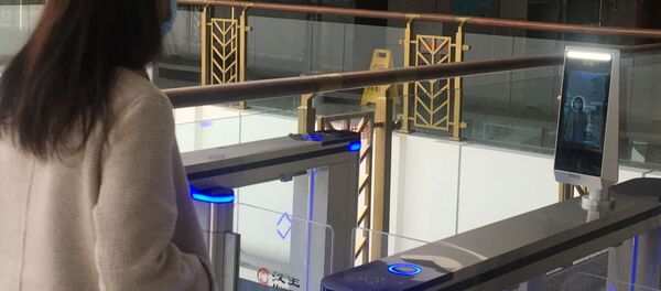 Программа, распознающая лица в масках - 俄罗斯卫星通讯社