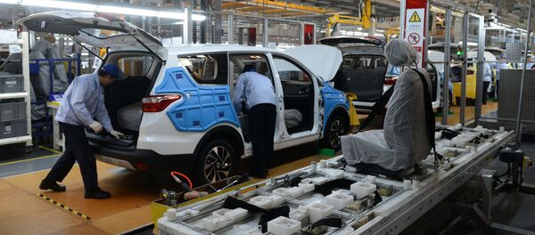 Сборка легковых автомобилей на заводе компании Changan в городе Чунцин в Китае. Сборка легковых автомобилей на заводе компании Changan в городе Чунцин в Китае. - 俄罗斯卫星通讯社