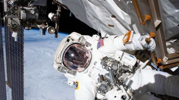 Американский астронавт в космосе - 俄罗斯卫星通讯社