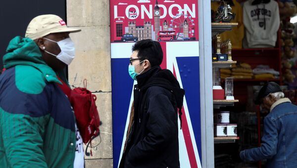 Пешеходы в масках в Лондоне  - 俄羅斯衛星通訊社