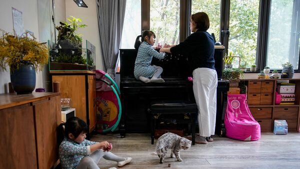 Семья во время карантина в Китае - 俄罗斯卫星通讯社