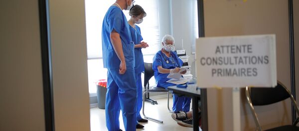 Медработники в больнице французского города Ванн, куда поступают заболевшие коронавирусом пациенты Медработники в больнице французского города Ванн, куда поступают заболевшие коронавирусом пациенты - 俄罗斯卫星通讯社