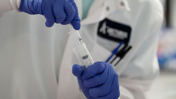 Ученый проводит исследование вакцины против нового коронавируса, Калифорния - 俄罗斯卫星通讯社