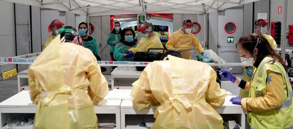 Пациенты прибывают в госпиталь в Мадриде - 俄罗斯卫星通讯社