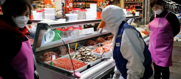 Дезинфекция рыбного рынка - 俄羅斯衛星通訊社