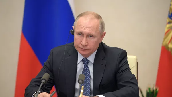 26 марта 2020. Президент РФ Владимир Путин во время участия в саммите лидеров Большой двадцатки по коронавирусу в режиме видеоконференции - 俄羅斯衛星通訊社