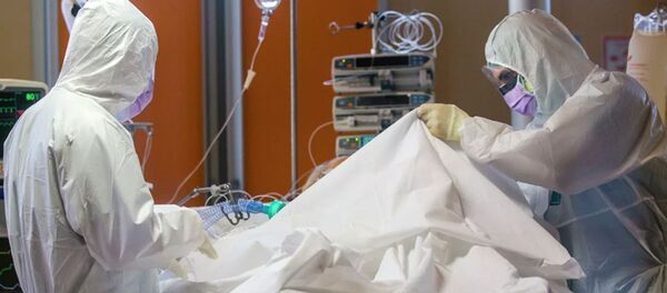 Медицинские работники в палате интенсивной терапии в одной из клиник Италии - 俄羅斯衛星通訊社