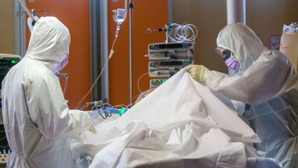 Медицинские работники в палате интенсивной терапии в одной из клиник Италии - 俄罗斯卫星通讯社