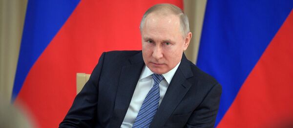 26 марта 2020. Президент РФ Владимир Путин во время встречи с представителями предпринимательского сообщества.  - 俄罗斯卫星通讯社