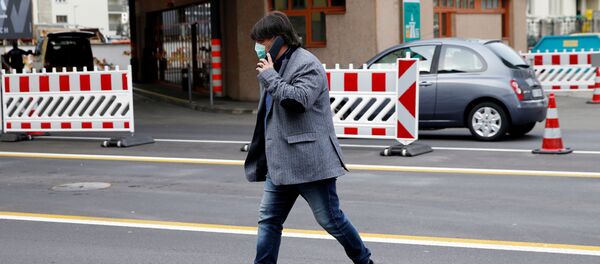 Мужчина в маске в Швеции - 俄罗斯卫星通讯社