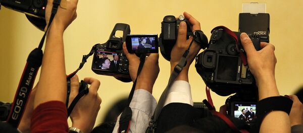 Журналисты с фотокамерами Журналисты с фотокамерами - 俄罗斯卫星通讯社