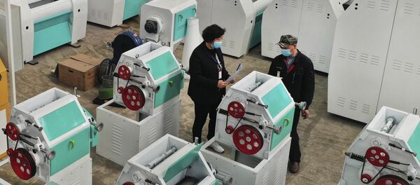 Рабочие на производстве машинного оборудования. Китай - 俄罗斯卫星通讯社