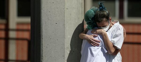 Медицинские работники одной из клиник в пригороде Мадрида, Испания Медицинские работники одной из клиник в пригороде Мадрида, Испания - 俄羅斯衛星通訊社