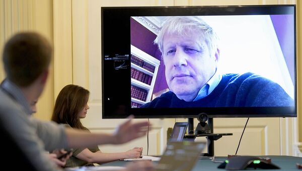 Премьер-министр Великобритании Борис Джонсон проводит удаленное совещание - 俄羅斯衛星通訊社