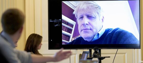 Премьер-министр Великобритании Борис Джонсон проводит удаленное совещание - 俄罗斯卫星通讯社