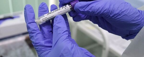 Сотрудник лаборатории - 俄羅斯衛星通訊社