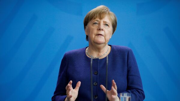 Канцлер Германии Ангела Меркель во время выступления на посвященном коронавирусу брифинге в Берлине  - 俄罗斯卫星通讯社