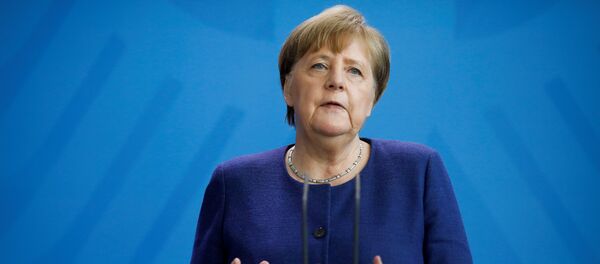 Канцлер Германии Ангела Меркель во время выступления на посвященном коронавирусу брифинге в Берлине  - 俄罗斯卫星通讯社