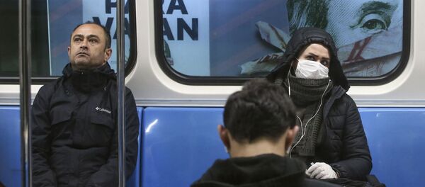 Пассажиры метро в масках в Стамбуле  - 俄罗斯卫星通讯社