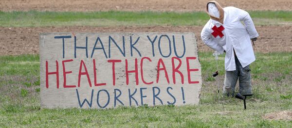 Надпись Спасибо, работники здравоохранения! на фермерском моле в Оуингсе, штат Мэриленд, США Надпись Спасибо, работники здравоохранения! на фермерском моле в Оуингсе, штат Мэриленд, США - 俄羅斯衛星通訊社