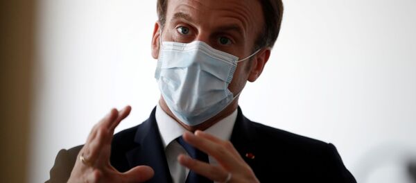 Президент Франции Эммануэль Макрон в защитной маске - 俄罗斯卫星通讯社