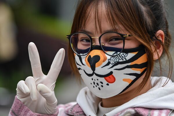 中国武汉街头一名戴口罩女子 - 俄罗斯卫星通讯社