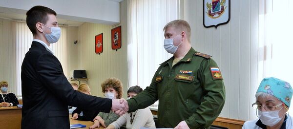 Призывник во время прохождения военно-врачебной комиссии в объединённом военном комиссариате (отделе) Чертановского района Южного административного округа в Москве. Призывник во время прохождения военно-врачебной комиссии в объединённом военном комиссариате (отделе) Чертановского района Южного административного округа в Москве. - 俄罗斯卫星通讯社