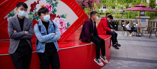 Люди в защитных масках. Ухань Люди в защитных масках. Ухань - 俄羅斯衛星通訊社