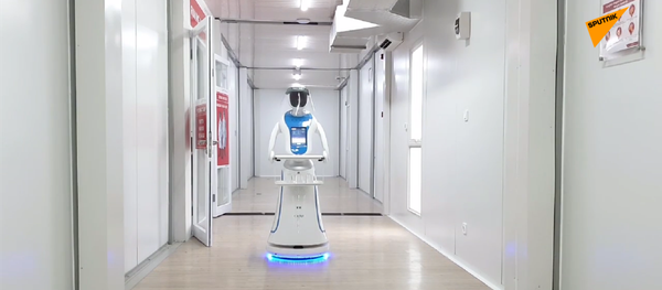 Сотрудникам Covid-госпиталя в Джакарте помогают роботы - 俄罗斯卫星通讯社