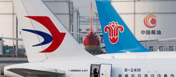 Самолеты в аэропорту в Пекине Самолеты в аэропорту в Пекине - 俄罗斯卫星通讯社