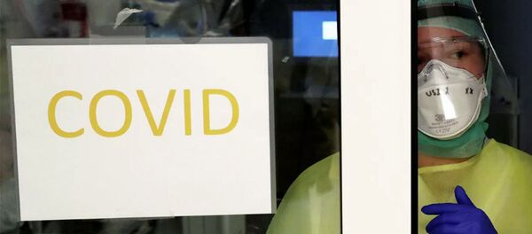 Медицинский персонал в отделении интенсивной терапии в больнице в Брюсселе, Бельгия - 俄罗斯卫星通讯社