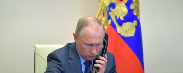 22 апреля 2020. Президент РФ Владимир Путин во время встречи в режиме видеоконференции с губернатором Воронежской области Александром Гусевым - 俄羅斯衛星通訊社