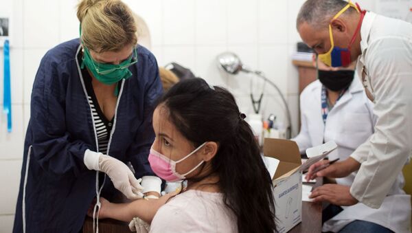 Медики проводят тестирование на коронавирус в фавелах Каракаса - 俄罗斯卫星通讯社