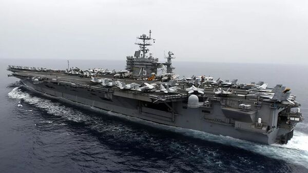 A general view shows the nuclear-powered aircraft carrier USS Harry S. Truman at an undisclosed position in the Mediterranean Sea, south of Sicily, Monday June 14, 2010 - 俄罗斯卫星通讯社