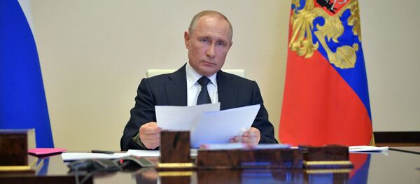 28 апреля 2020. Президент РФ Владимир Путин проводит в режиме видеоконференции совещание с главами регионов по борьбе с распространением коронавируса в РФ.  - 俄罗斯卫星通讯社