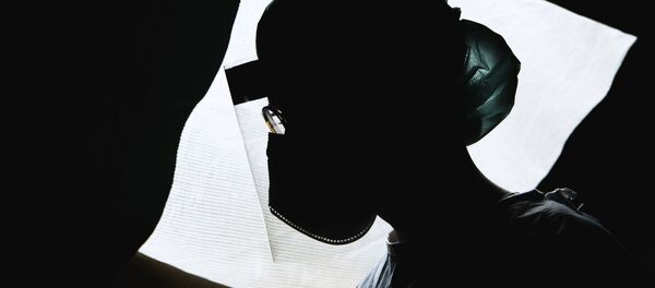 Медсестра в защитной маске - 俄罗斯卫星通讯社