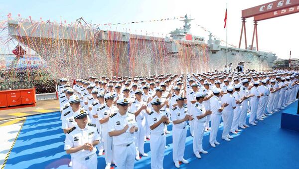 25 сентября 2019 года Китай провел церемонию запуска первого десантного корабля типа 075 в Шанхае. Архивное фото - 俄羅斯衛星通訊社