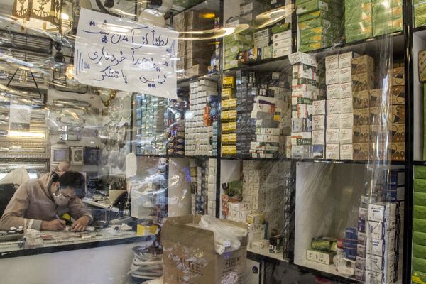 Продавец в магазине в Тегеране - 俄羅斯衛星通訊社