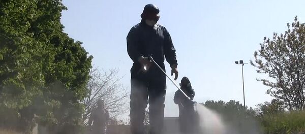 Сотрудники министерства обороны РФ проводят санитарную обработку территории лечебного учреждения в провинции Брешиа в Ломбардии. - 俄罗斯卫星通讯社