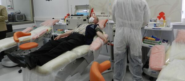 Представитель ВОЗ, переболев коронавирусом, сдает кровь в Иранском центре переливания крови для больных Covid-19 - 俄罗斯卫星通讯社