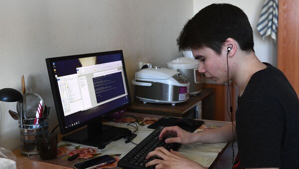 Студент Новосибирского государственного технического университета (НГТУ) в своей комнате в общежитии вуза. - 俄罗斯卫星通讯社
