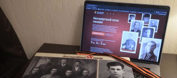 Подготовка к участию в акции Бессмертный полк онлайн - 俄罗斯卫星通讯社