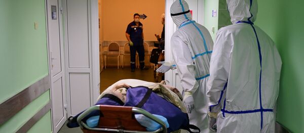 Пациент и медицинские работники в городской клинической больнице имени В. В. Виноградова - 俄罗斯卫星通讯社